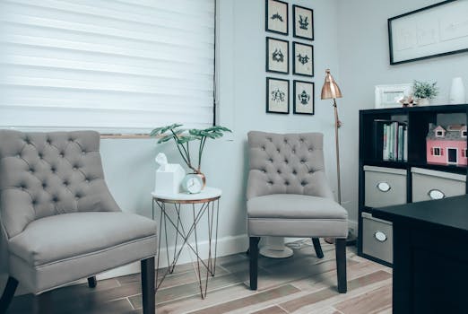 A cozy home office with plants and comfortable seating