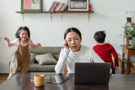 busy home office with kids playing