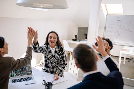 image of a team celebrating a project success