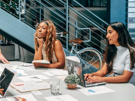 Image of diverse workers collaborating remotely